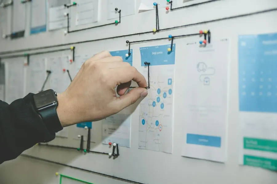 Strategist mapping a plan on a whiteboard