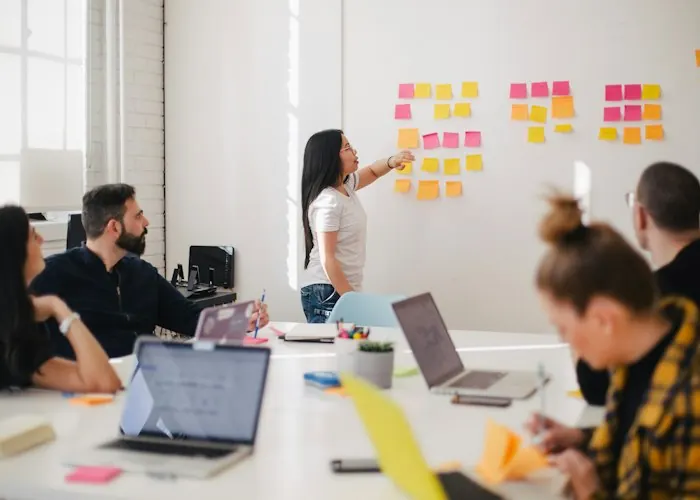 Team workshop with sticky notes on a wall