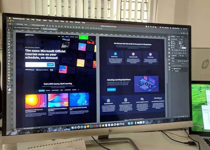 Website designs on a large monitor